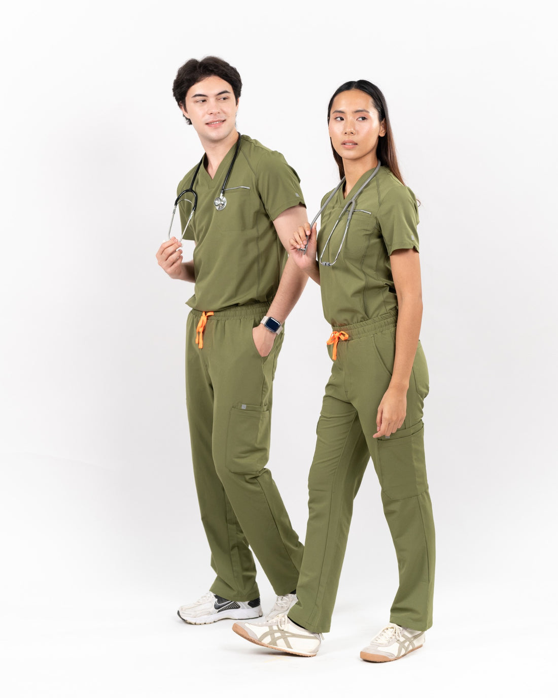 Elite scrub set in Olive on two models